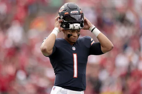 Commanders vs. Bears props, odds, best bets, AI predictions, TNF picks:  Justin Fields over 0.5 interceptions 