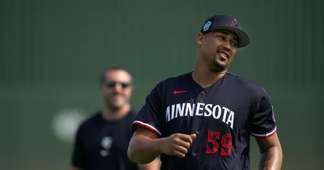 Minnesota Twins pitcher Jhoan Duran (59) delivers a pitch in the