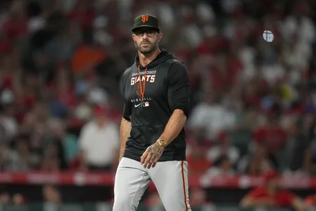 Giants open 9-run lead, hang to to beat Rockies 11-10 and stop