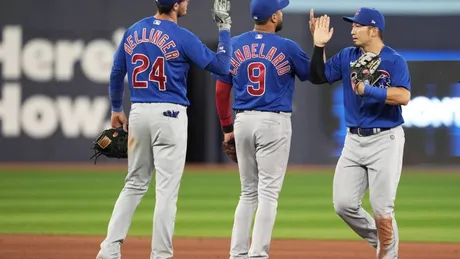 Left fielder Ian Happ saves Cubs with 2 late throws to plate in