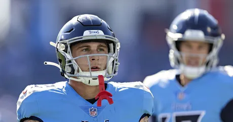 Tennessee Titans guard Jordan Roos (70) walks on the sideline in the first  half of an