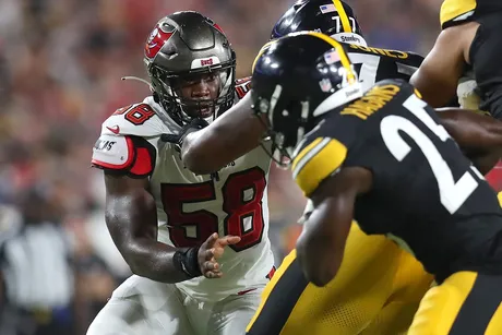 Tampa Bay Buccaneers offensive tackle Brandon Walton (73) walks