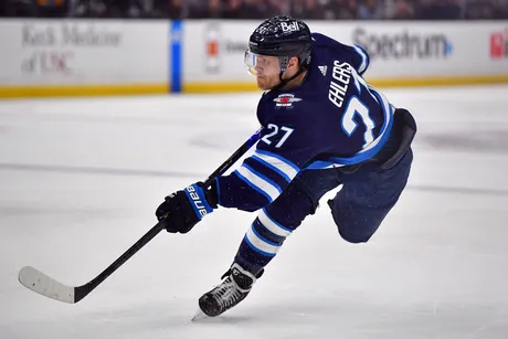 Jets sign Declan Chisholm to one-year, two-way contract