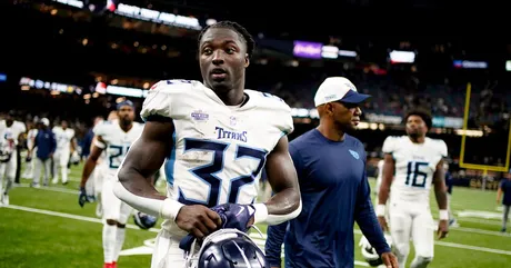 Tennessee Titans guard Jordan Roos (70) walks on the sideline in the first  half of an