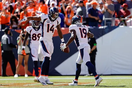 Denver Broncos wide receiver Brandon Johnson (89) runs with the