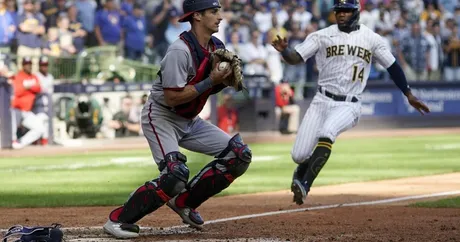 Canha's grand slam in 8th gives NL Central-leading Brewers a 9-5 victory  over Nationals 