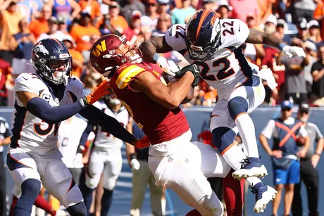 The Washington Commanders trail the Denver Broncos 21-14 at