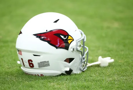 Arizona Cardinals running back Corey Clement (23) handles the ball against Minnesota  Vikings cornerback Jaylin Williams (38) during the second half of an NFL  preseason football game Saturday, Aug. 26, 2023 in