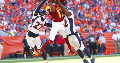 The Washington Commanders trail the Denver Broncos 21-14 at