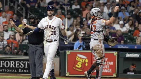Dubon's 9th-inning single lifts Astros over Orioles 2-1 to stay atop AL West