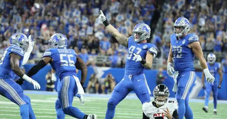 Detroit Lions place kicker Riley Patterson, right, kicks a 37-yard