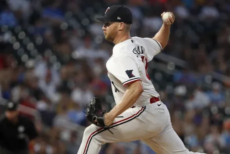 Dylan Floro of the Miami Marlins prepares to deliver a pitch in the News  Photo - Getty Images