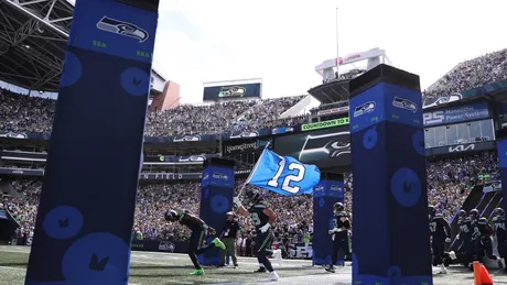 Seattle Seahawks tight end Noah Fant (87) jogs during warmups during a  Back Together Weekend event