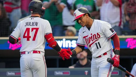 Playoff-bound Twins eke out win over Rockies