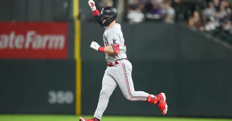 Playoff-bound Twins eke out win over Rockies