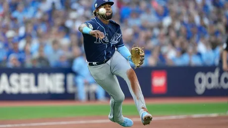 Kirk and Bichette push Blue Jays to brink of wild card berth with 11-4 win  over Rays