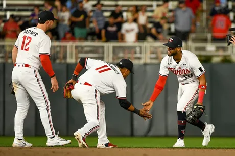 Playoff-bound Twins eke out win over Rockies