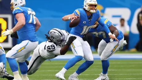 Raiders' news: Jerry Tillery ejected after late hit on Justin Herbert -  Silver And Black Pride