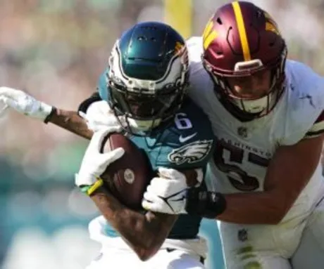 HERE'S EAGLES AJ TAKING A SHARPIE TO HIS NFL-BLESSED PINK SHOES