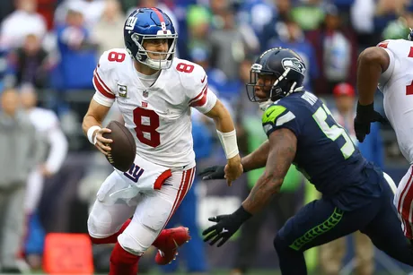 Seattle Seahawks tackle Abraham Lucas (72) walks on the field